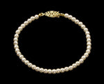 #9586-725 - 4mm Simulated Ivory Pearl Bracelet - 7.25" (Temporary Sale) Pearl Neck & Ears Rhinestone Jewelry Corporation