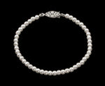#9585-725 - 4mm Simulated White Pearl Bracelet - 7.25"